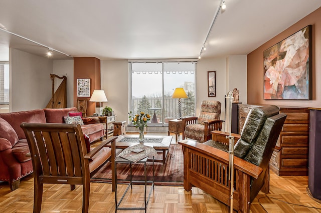 interior space with expansive windows and rail lighting