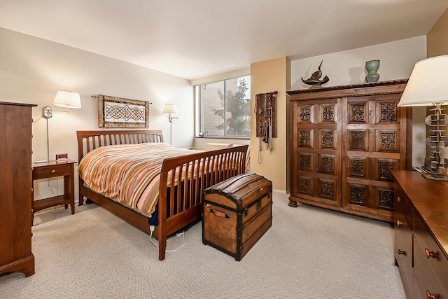 bedroom with light carpet