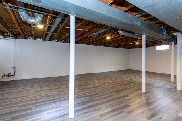 basement featuring wood finished floors