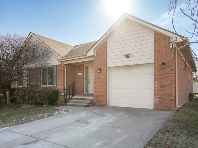 ranch-style house with an attached garage, driveway, a shingled roof, and brick siding