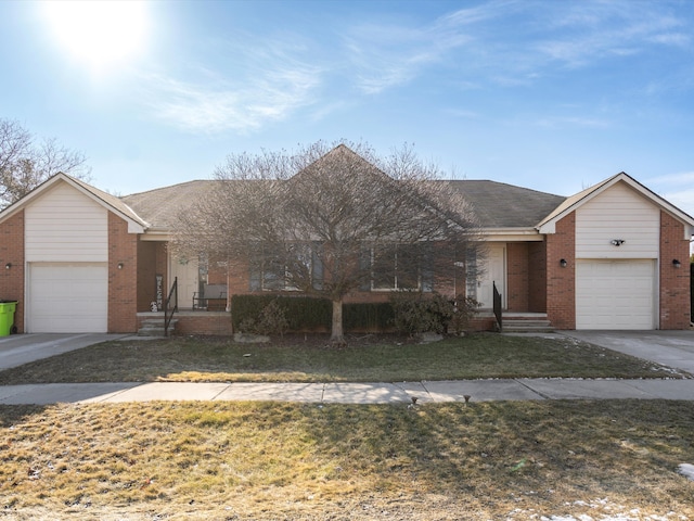 ranch-style house with brick siding, a front lawn, an attached garage, and a shingled roof