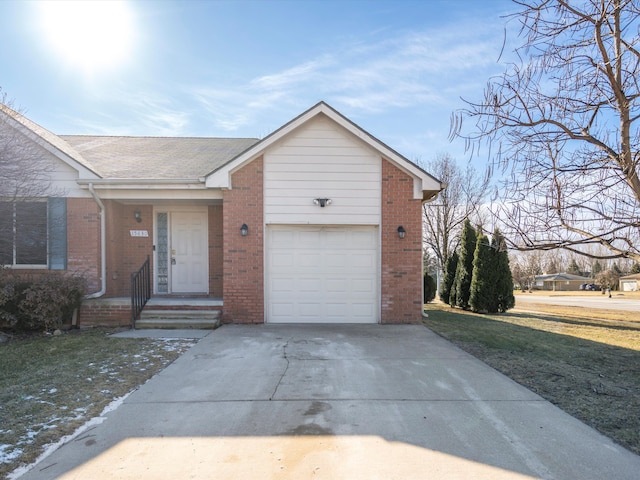 ranch-style home featuring brick siding, roof with shingles, a front yard, a garage, and driveway