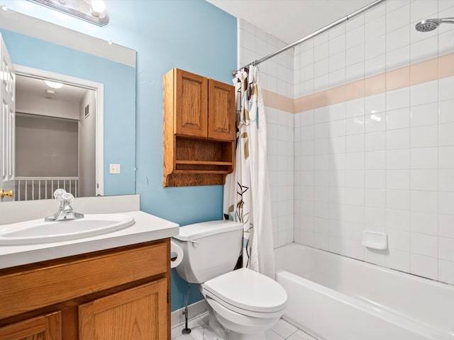 bathroom with visible vents, vanity, shower / bath combo with shower curtain, and toilet