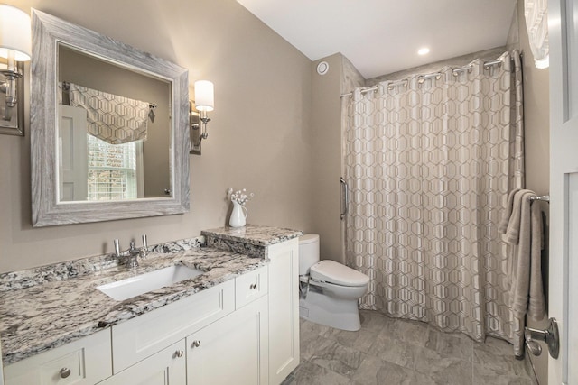 full bathroom featuring a shower with curtain, marble finish floor, vanity, and toilet