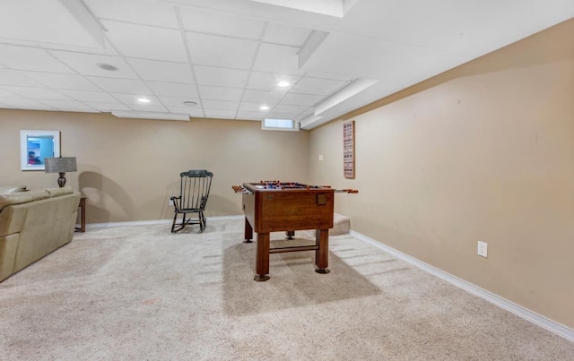 game room with carpet flooring, recessed lighting, baseboards, and a drop ceiling