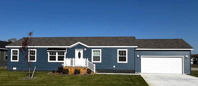 ranch-style home featuring driveway, a front yard, and an attached garage