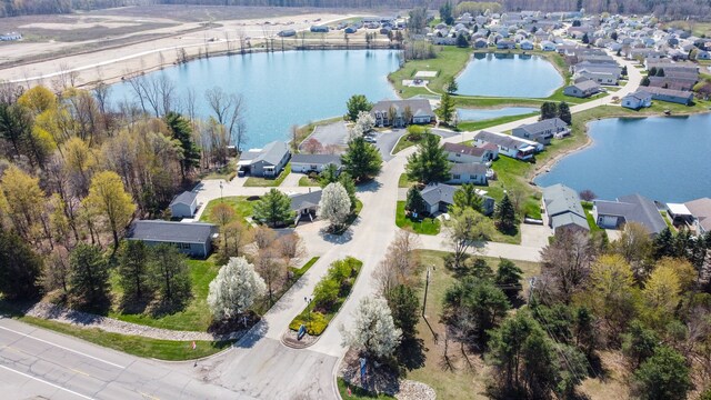 aerial view featuring a water view and a residential view