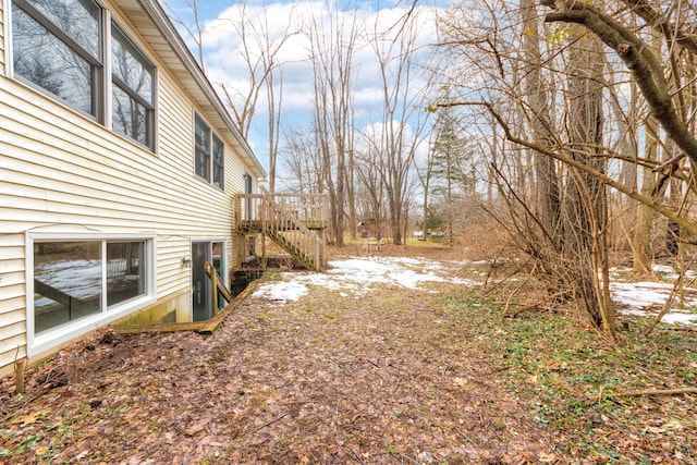 view of yard featuring stairway