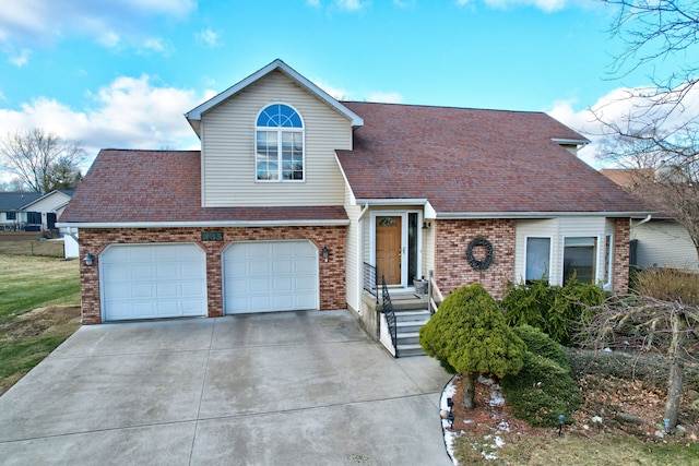 view of front of house featuring a garage, driveway, brick siding, and roof with shingles