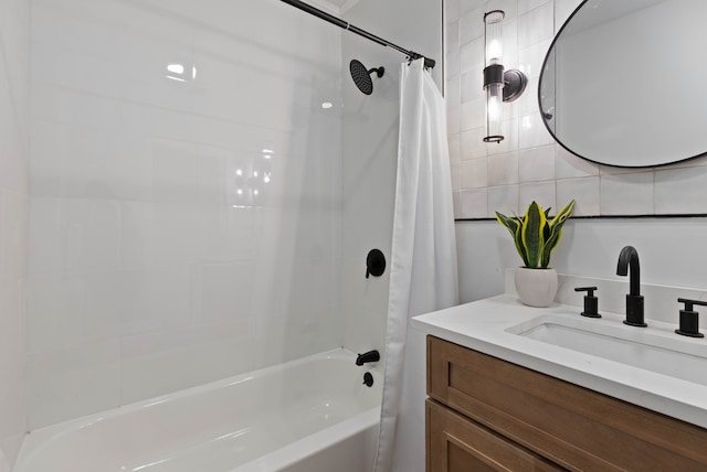 full bathroom with shower / bath combo and vanity