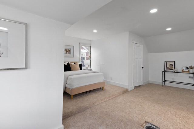 bedroom featuring carpet, baseboards, vaulted ceiling, and recessed lighting