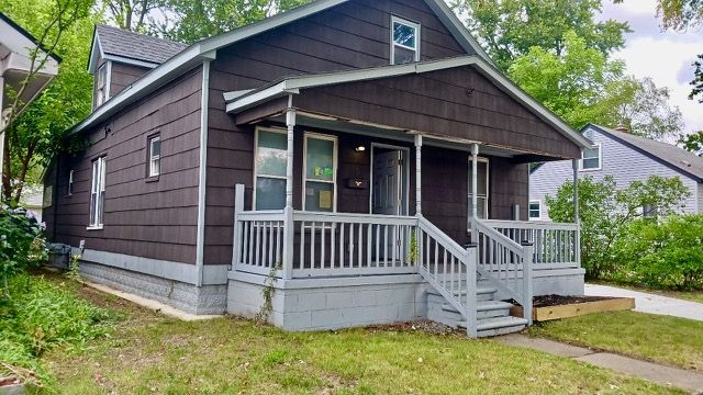 bungalow-style home with a porch