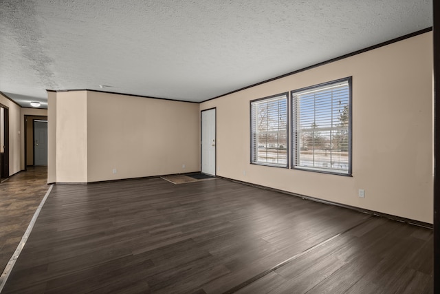 unfurnished room with crown molding, a textured ceiling, and dark wood-style flooring