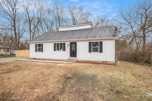 view of front of property featuring crawl space, entry steps, a front yard, and roof with shingles