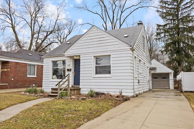 bungalow-style home with a gate, a chimney, fence, and a shingled roof