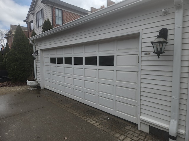 garage featuring driveway