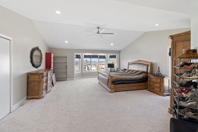 bedroom with recessed lighting, light colored carpet, baseboards, and lofted ceiling