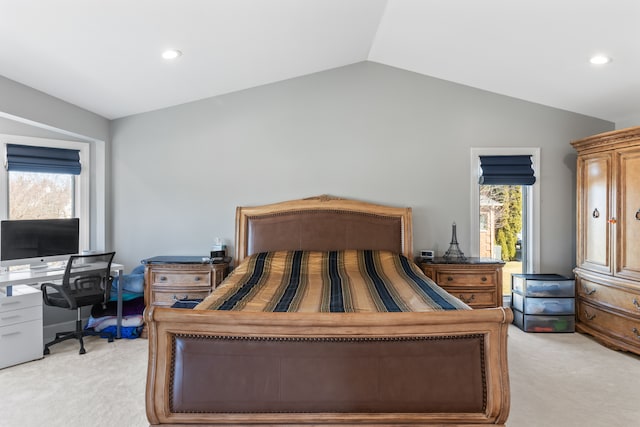 bedroom featuring recessed lighting, multiple windows, lofted ceiling, and light carpet