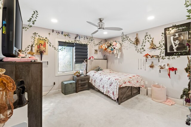 carpeted bedroom with recessed lighting and a ceiling fan