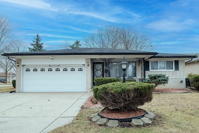 ranch-style home with a garage, concrete driveway, brick siding, and a shingled roof