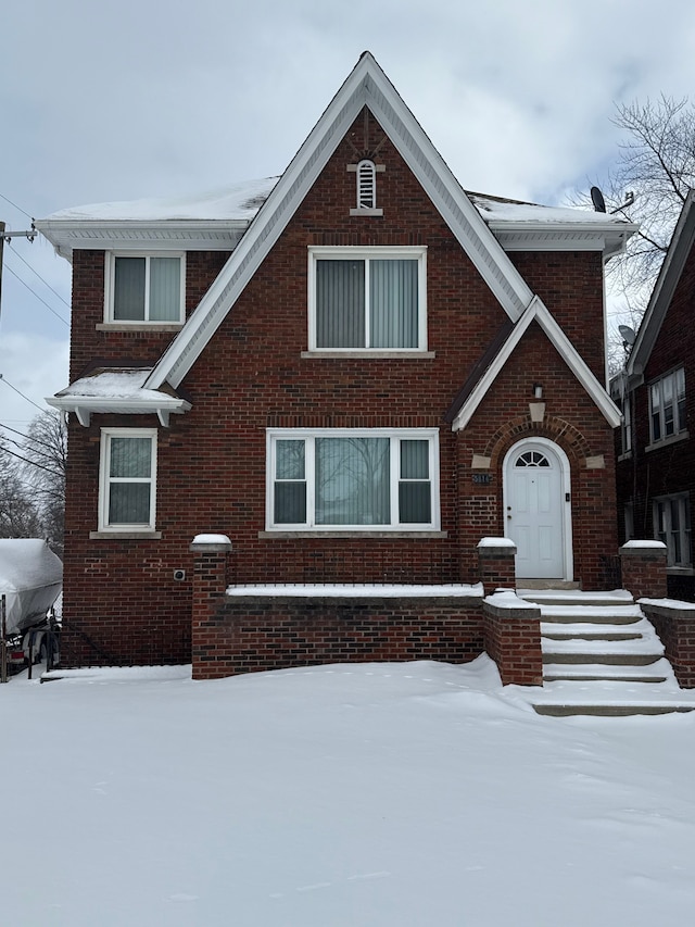 view of front of house with brick siding