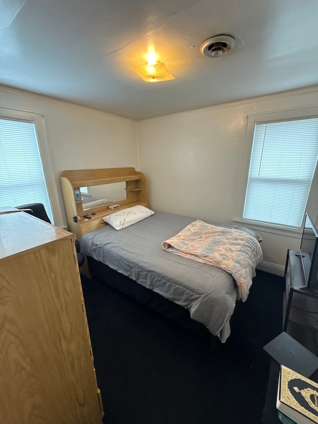 bedroom with visible vents