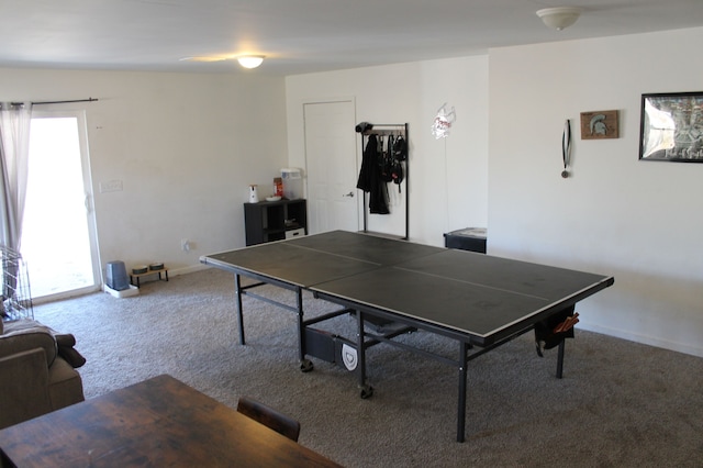 rec room with plenty of natural light, baseboards, and carpet floors