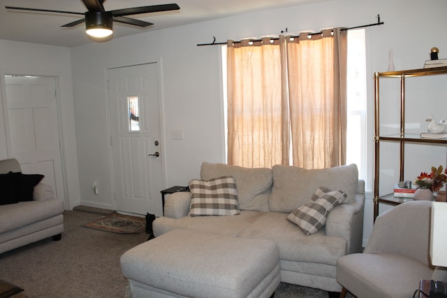 living room with carpet flooring and ceiling fan