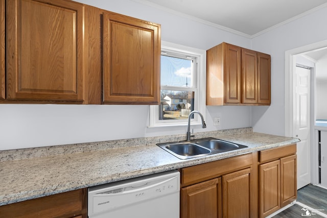 kitchen with a sink, crown molding, dishwasher, brown cabinetry, and dark wood-style flooring