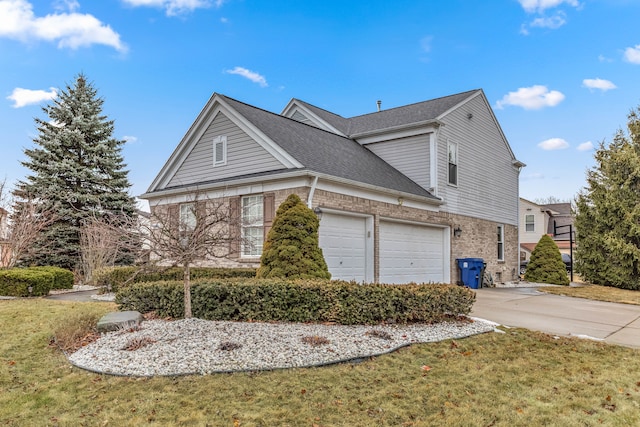 view of front of property with a front yard, roof with shingles, an attached garage, concrete driveway, and brick siding