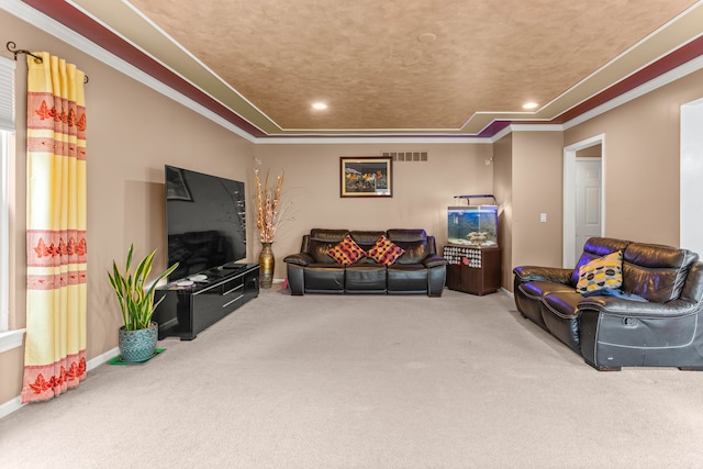 carpeted living room featuring visible vents, crown molding, baseboards, a tray ceiling, and recessed lighting