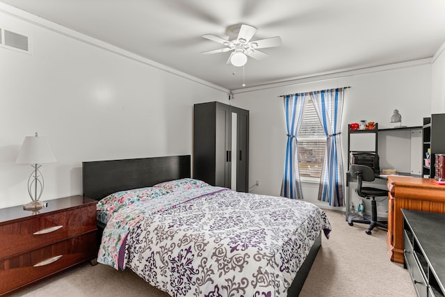 bedroom with ceiling fan, visible vents, light carpet, and ornamental molding