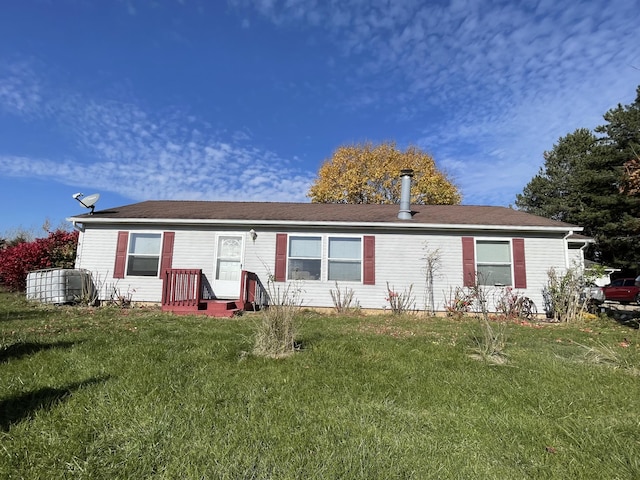 single story home featuring a front yard