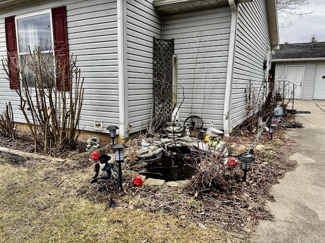 view of property exterior featuring a garage