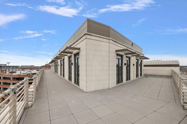 view of property exterior featuring a balcony