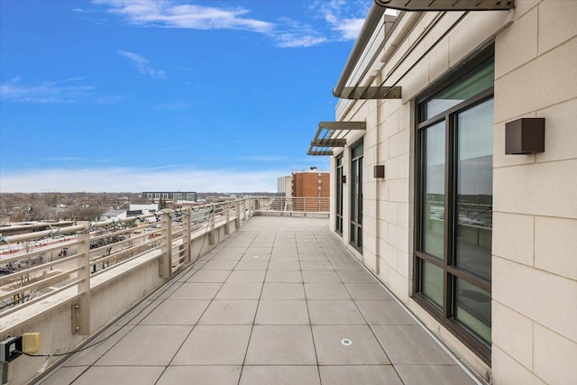 balcony featuring a view of city