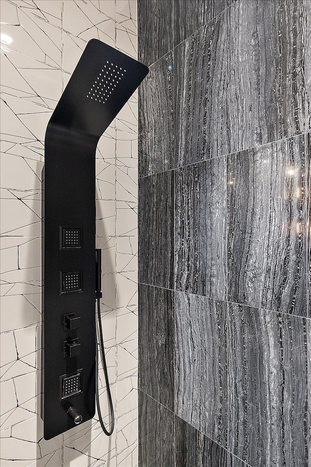 details with a tile shower