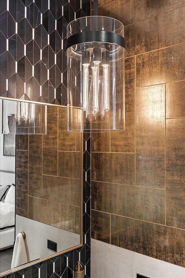 interior details with a walk in shower