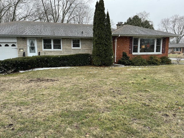 ranch-style house featuring brick siding, a chimney, a garage, stone siding, and a front lawn