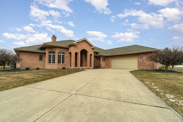 view of front of home featuring a garage, brick siding, and a front yard