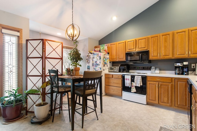 kitchen featuring brown cabinets, light countertops, black appliances, a chandelier, and pendant lighting