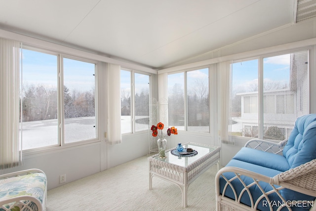 sunroom / solarium with lofted ceiling