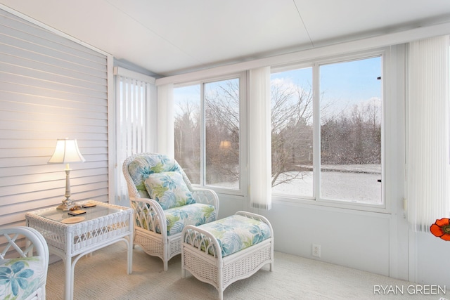 sunroom / solarium featuring a healthy amount of sunlight