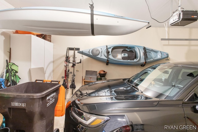 garage featuring a garage door opener