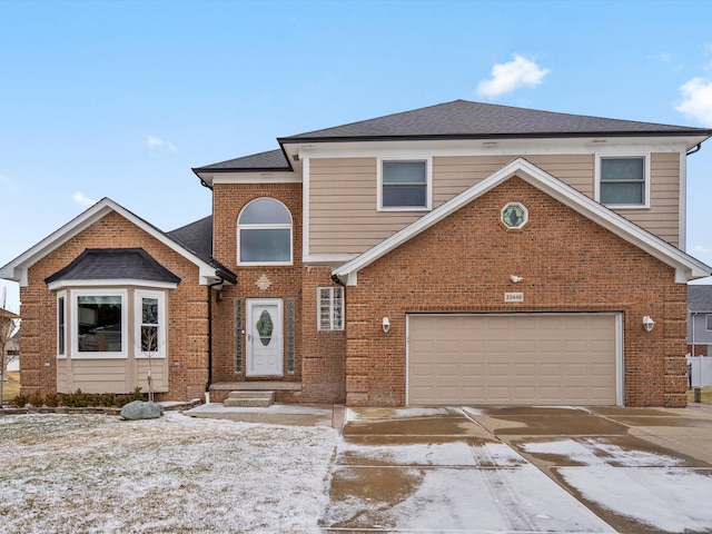 view of front of property featuring a garage, concrete driveway, brick siding, and roof with shingles