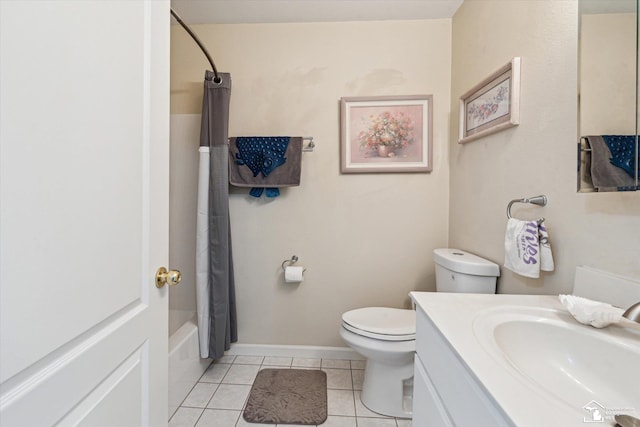 bathroom featuring toilet, shower / tub combo, vanity, tile patterned flooring, and baseboards