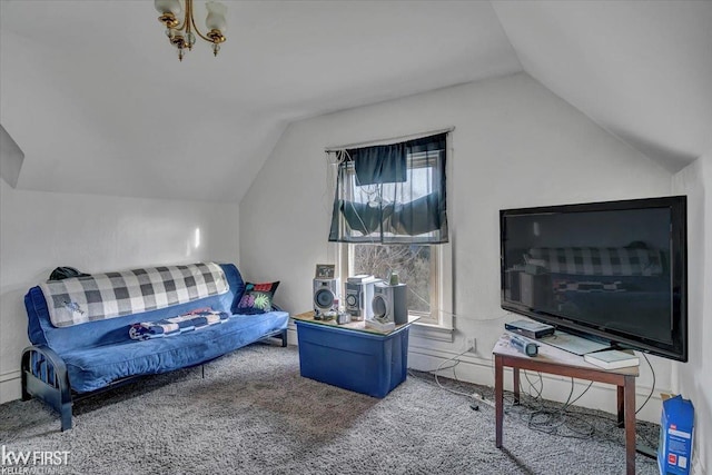 carpeted living room with vaulted ceiling