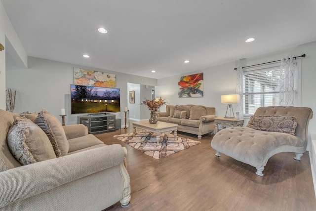 living room with recessed lighting and wood finished floors