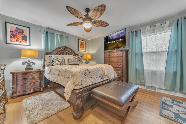 bedroom featuring a ceiling fan and wood finished floors