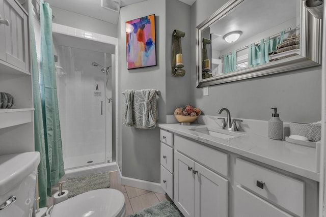 bathroom featuring visible vents, a stall shower, toilet, and vanity